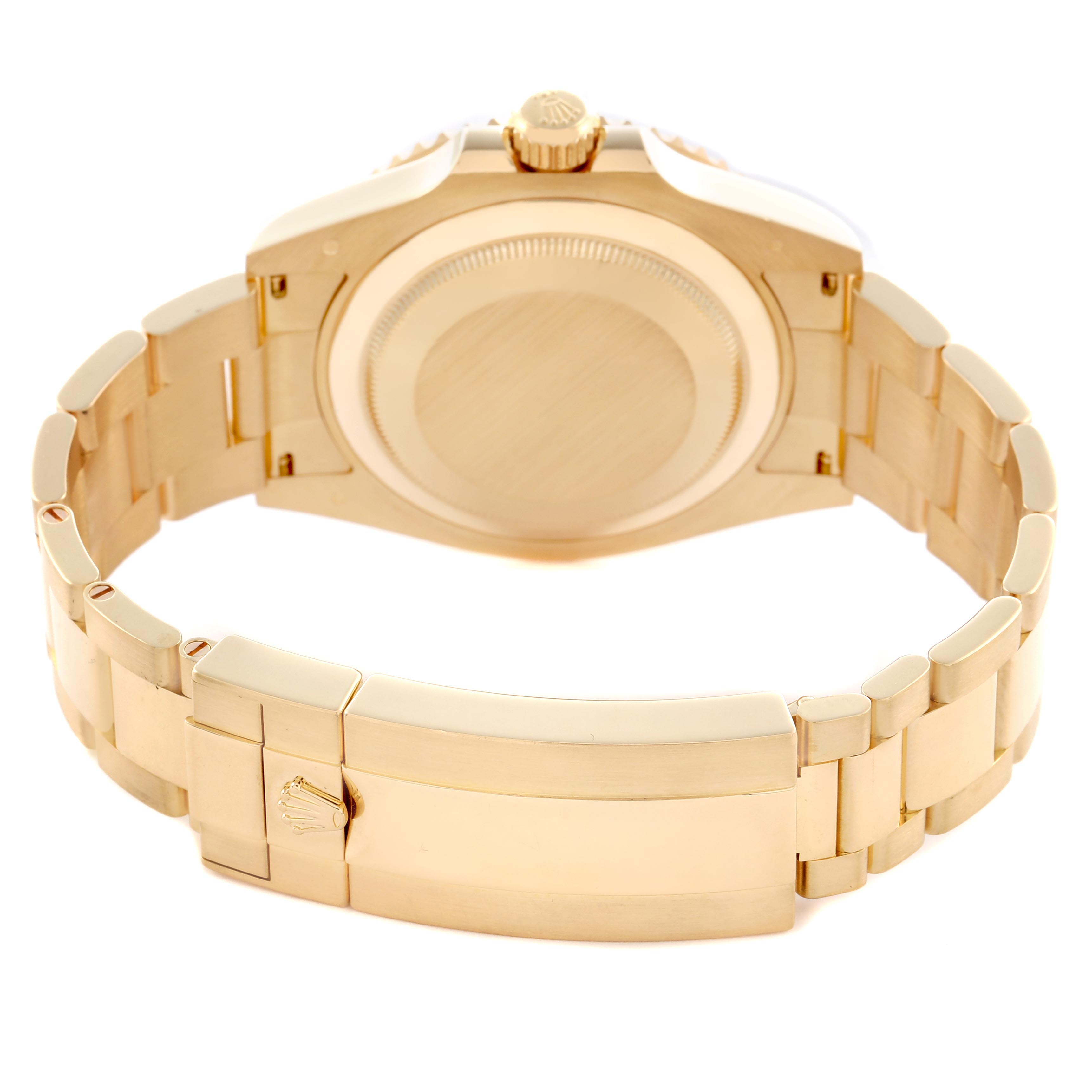 The image shows the back view of a Rolex Submariner 126618 Men's Yellow Gold Black Dial, highlighting the case back and clasp of the bracelet.